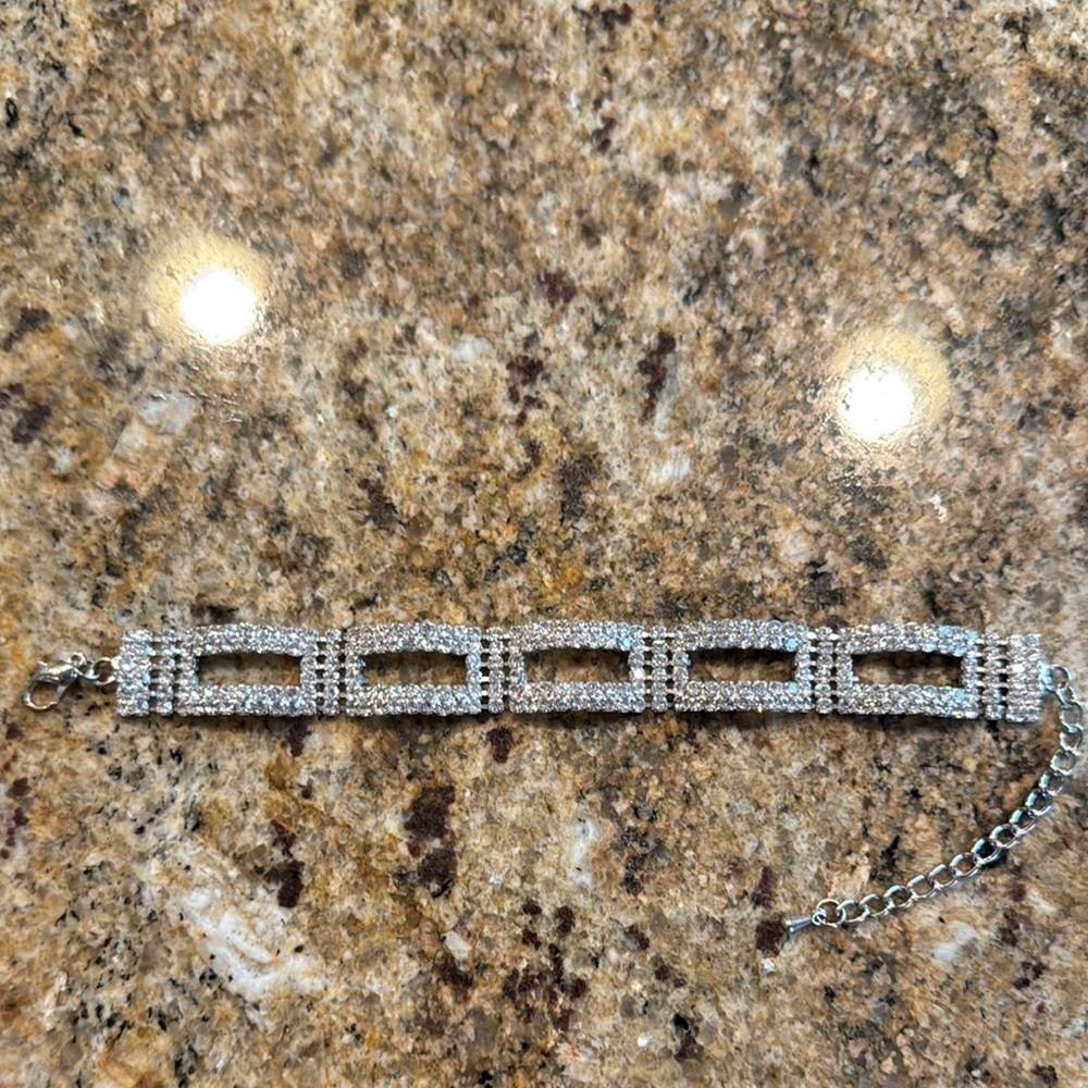 Sparkly silver crystal open rectangle adjustable bracelet.